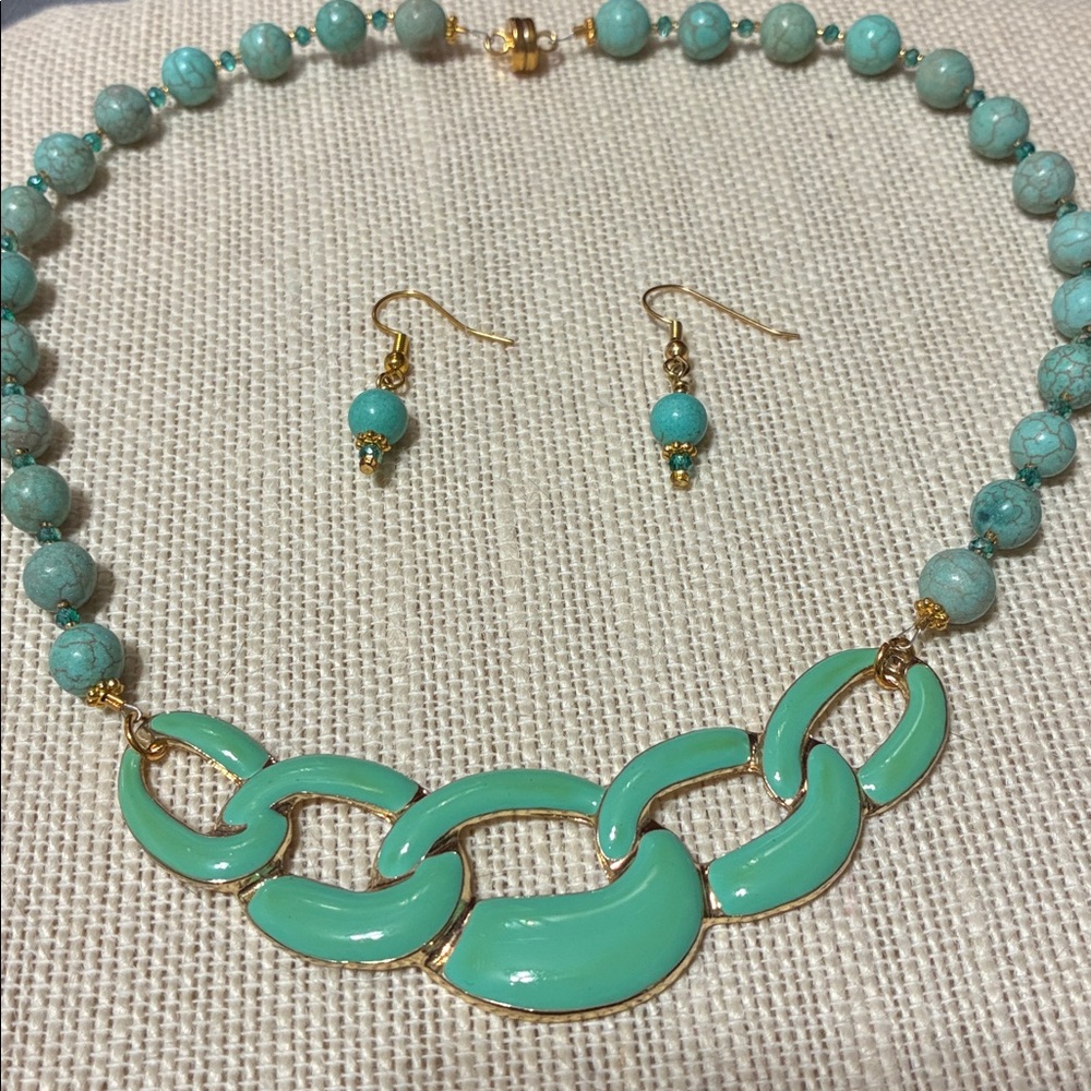 Elegant hand crafted Turquoise and Gold Necklace and matching pierced earrings
